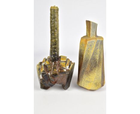 RIZU TAKAHASHI (born 1941); a faceted wood fired stoneware bottle and a footed bottle form with narrow neck, incised signatur