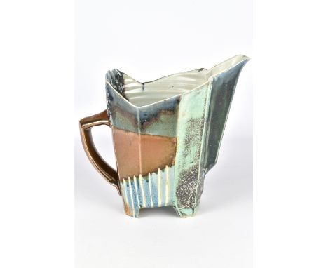 H P BLOOMER; a faceted stoneware footed jug perforated above the handle, impressed HP mark, height 21cm.Bloomer's tableware i