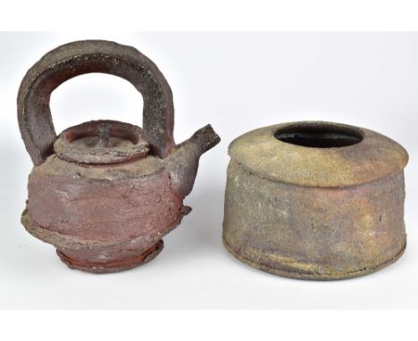 DREW NICKLAS; a wood fired stoneware teapot with textured surface and a jar, impressed D marks, tallest 21.5cm (2).Additional