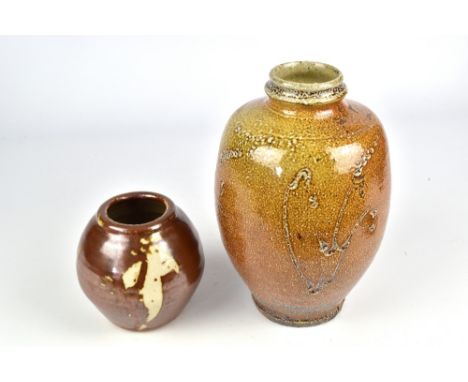 JIM MALONE (born 1946); a salt glazed bottle with incised grasses and a small vase covered in kaki glaze with a wax resist pa