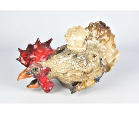 CORNELIA NEVITT; a raku teapot in the form of a rooster covered in white crackle glaze with copper red, cobalt and ochre deta