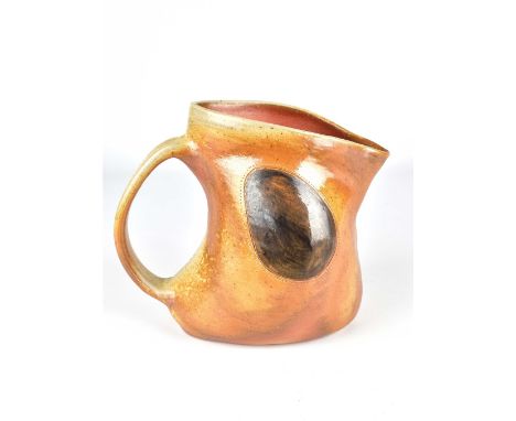 AUDREY ROSULEK; a wood fired stoneware jug, incised signature, height 18.5cm.Rosulek finishes her pots with scribbles and ske