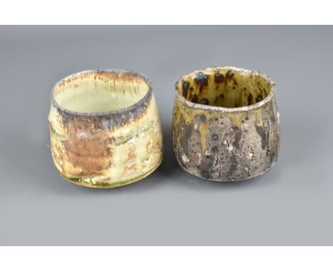 STEPHEN PARRY (born 1950); a wood fired stoneware yunomi and a wood fired porcelain yunomi, impressed SP marks, tallest 9cm (