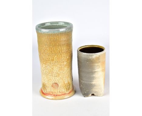 RICHARD BURKETT; a cylindrical wood fired stoneware vase with textured surface and concentric ring decoration and a porcelain