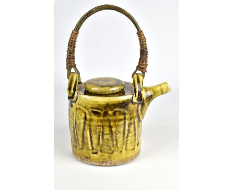 ANNE METTE HJORTSHOJ (born 1973); a salt glazed teapot with willow handle and porcelain slip, impressed AMH mark, height 13.5