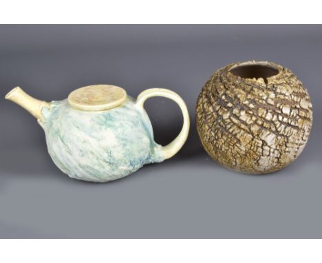 ALAIN FICHOT (born 1952); a porcelain teapot with textured surface and a globular stoneware vase, impressed and incised marks