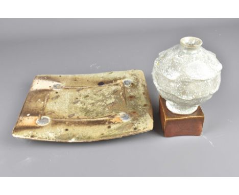 STEPHEN PARRY (born 1950); a rectangular wood fired stoneware footed platter and a globular vase on a square plinth, impresse