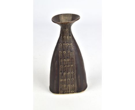LUCIE RIE (1902-1995); a tapered porcelain bottle covered in manganese glaze with sgraffito trellis pattern, impressed LR mar