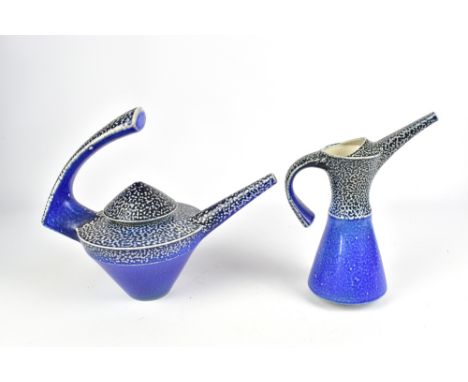 JEREMY NICHOLS (born 1948); a salt glazed teapot and jug, impressed JN marks, tallest 24.5cm (2). (D)Provenance: Purchased fr