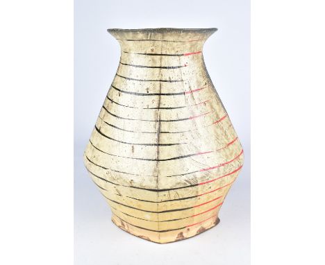 TOM JASZCZAK; an angular earthenware vase with painted linear decoration, height 28cm.Jaszczak is strongly rooted in the trad
