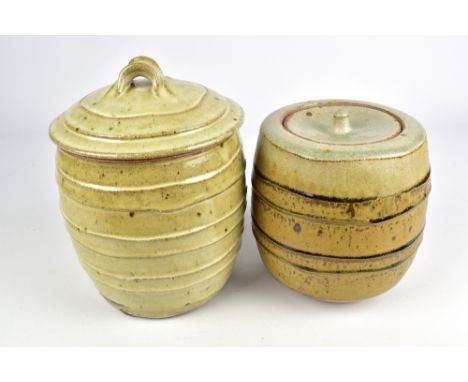 PHIL ROGERS (born 1951); a stoneware jar and cover with straped surface covered in nuka glaze and a smaller jar and cover, im