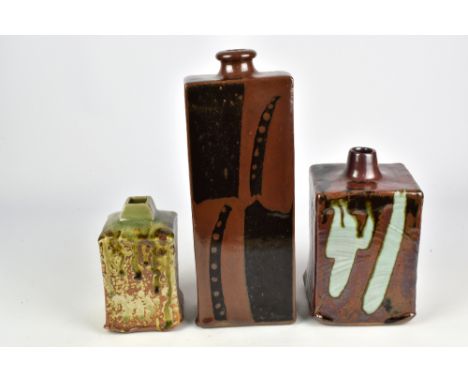 DAVID FRITH (born 1943) for Brookhouse Pottery; a tall rectangular bottle covered in tenmoku and kaki glaze and two square bo