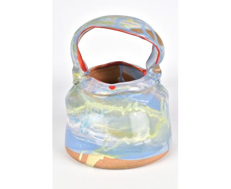RENEE BROWN (born 1973); an earthenware basket, pale blue and green slip with crimson detailing, incised signature, height 20