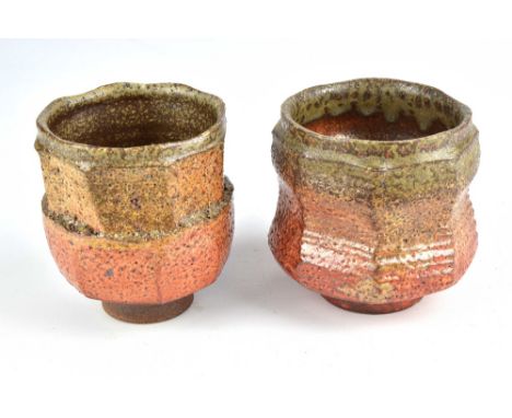 CHAD STEVE; a near pair of faceted wood fired stoneware cups with shino glaze, tallest 10cm (2).Steve is based in Houston, Te
