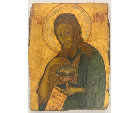 A 19th / early 20th century Russian wooden panel icon, 31 x 39cm.