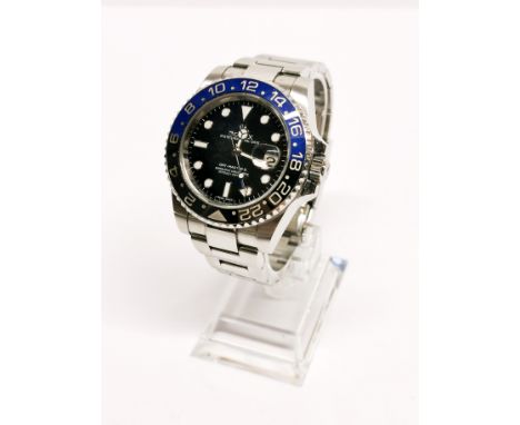 A Rolex GMT Master II (Batman) stainless steel chronometer wristwatch, recently serviced and in full working order. Condition