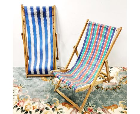 Two vintage folding deck chairs.
