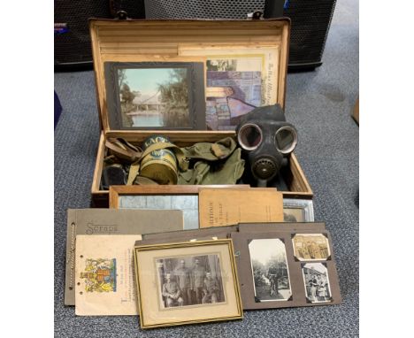 A vintage case of interesting mostly war time items and ephemera.