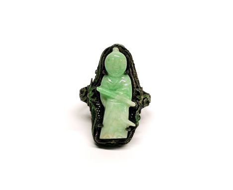 A fine antique Chinese carved jade figure mounted on enamelled silver as a ring c. 1920's, figure H. 2.5cm, ring size adjusta