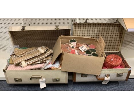 Two vintage cases of 1950's-70's fabrics, with a quantity of old rug wool, hats etc.