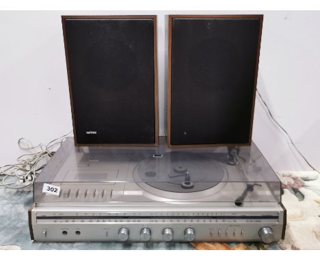 A Phillips vintage music centre and speakers.
