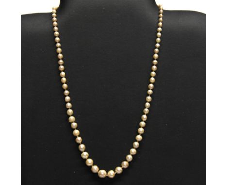 A vintage string of graduated cultured pearls with a white metal and diamond clasp, necklace L. 46cm.