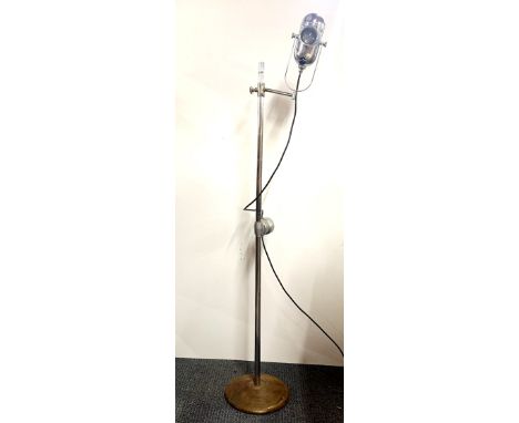 A vintage chromium plated medical lamp, H. 164cm.