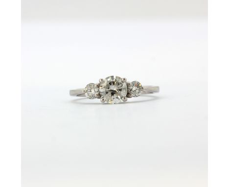 A hallmarked platinum ring set with three large bright brilliant cut diamonds, approx. 1.50ct total, colour G/H, clarity PK, 