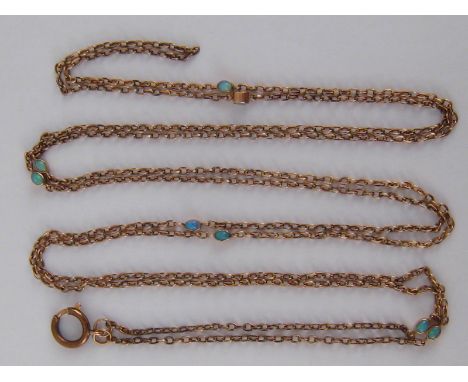 An antique 9 carat gold opal set long guard necklace chain, approx 145cm long, 14.5 gms.