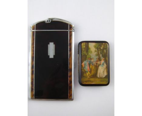 A Ronson Art Deco combined cigarette case and lighter in chrome with faux tortoiseshell lacquer panels. 15x8cm., together wit