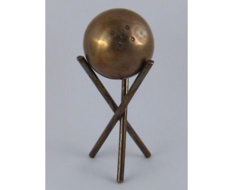 A trophy in the form of a silver ball and a plated tripod stand. George and John Morgan, Glasgow, 1946. Silver wt. 281gm.