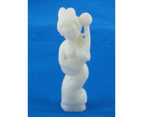 A white jade figure of a female musician. ht.7.5cm. 