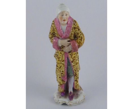 Meissen. A ceramic figure of a gentleman in dressing gown and bedcap, Meissen mark to base. Ht. 16.5cm. 