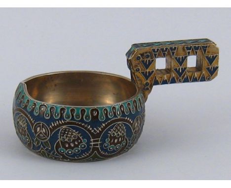 Faberge. A Russian silver kovsh cloisonne enamelled in green, blue and brown, the enamelling and handle in the Pan Slavic sty