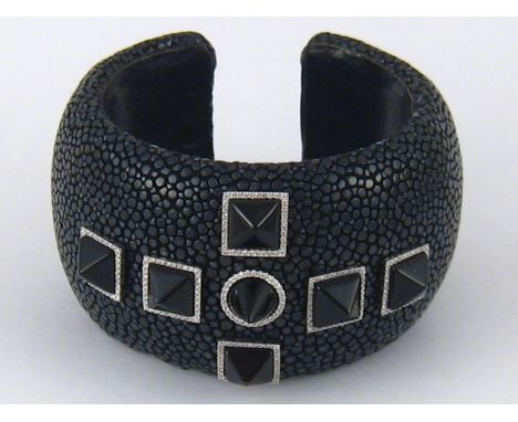 An unusual shagreen, onyx and diamond set bangle, approx 4cm wide.
