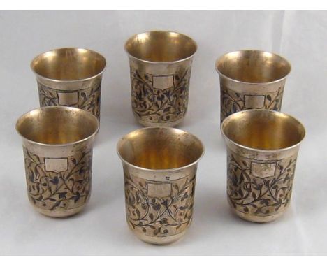 A set of six Russian niello silver vodka tots, Pyetr Lobanov, Moscow, 1864. Wt.262gm. 