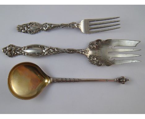A Danish silver gilt spoon in the 17th century manner with angel's head finial, Copenhagen, circa 1900, together with two Ame