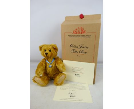 Steiff - A boxed limited edition Steiff Golden Jubillee Teddy Bear made exclusively for the Guild Of Specialist Glass And Chi