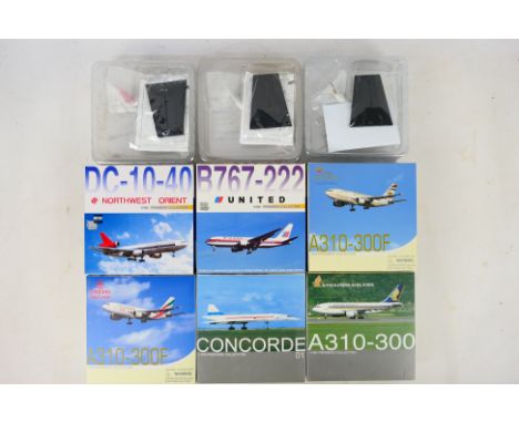 Dragon Wings - 6 x boxed Premiere Collection aircraft in 1:400 scale including Concorde number 1, an A310-300F in Emirates Sk