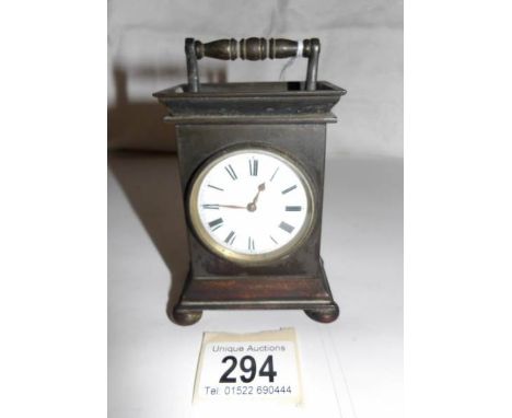 A 19th century 'gun' metal carriage clock with ornate movement marked Will Camden 1230 London