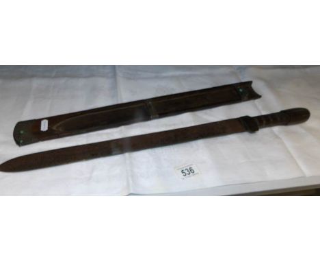 An Irish Celtic short sword in wooden scabbard with silver and turquoise detail (some stones missing)
 
Tibetan/Chinese? Swor