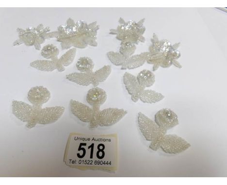 A quantity of vintage beadwork flowers