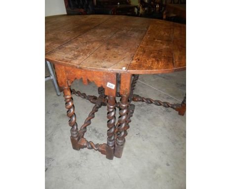 A period oak barley twist gate leg table
 
154cm wide, 137cm length, 76cm height, when open
44cm wide, 137cm length, when clo