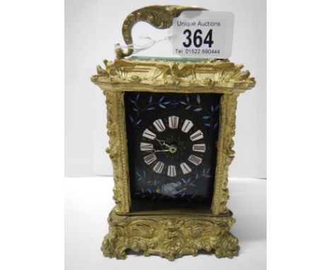 A carriage clock, a/f
 
No glass panels on sides or front
Missing door
Movement incomplete
Missing escapement
There is no key