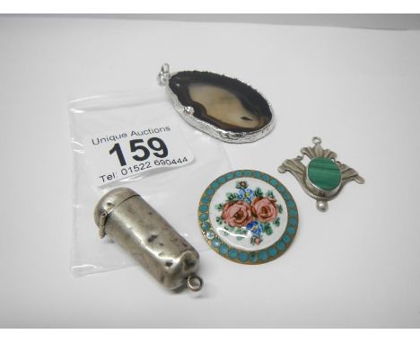 An enamel brooch, a malachite pendant, a silver agate pendant and a silver cheroot holder