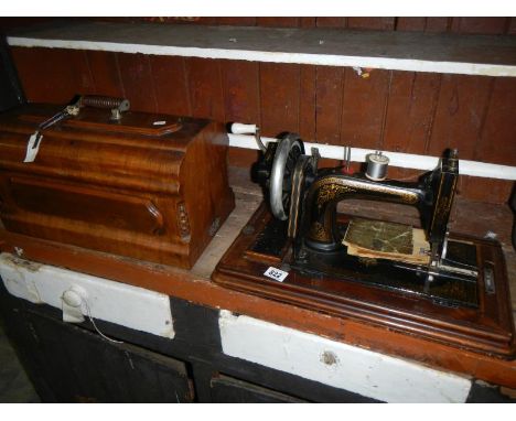 A vintage cased Douglas &amp; Co., sewing machine