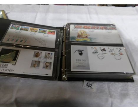 2 folders of first day covers, regional and definitive covers, some 1960's