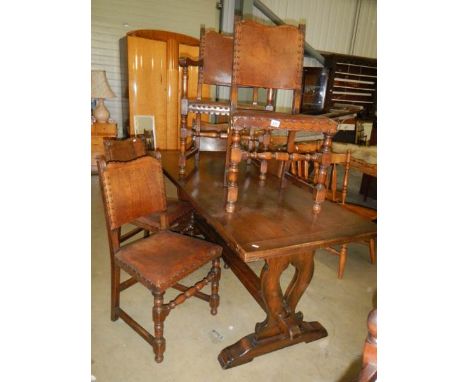 An oak refectory table and 6 chairs
 
Length approximately 181.5cm
Width approximately 74.25cm
Height approximately 73.5cm
To