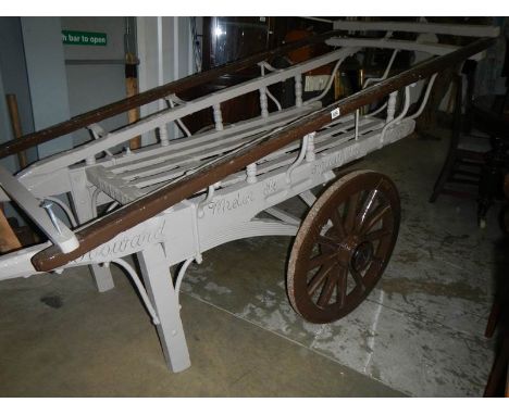 A Victorian hand cart
 
All woodwork and wheels in solid condition
There are traces of old woodworm mostly covered by layers 
