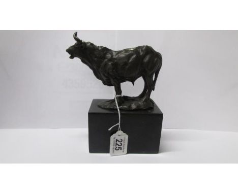 A bronze bull on marble base